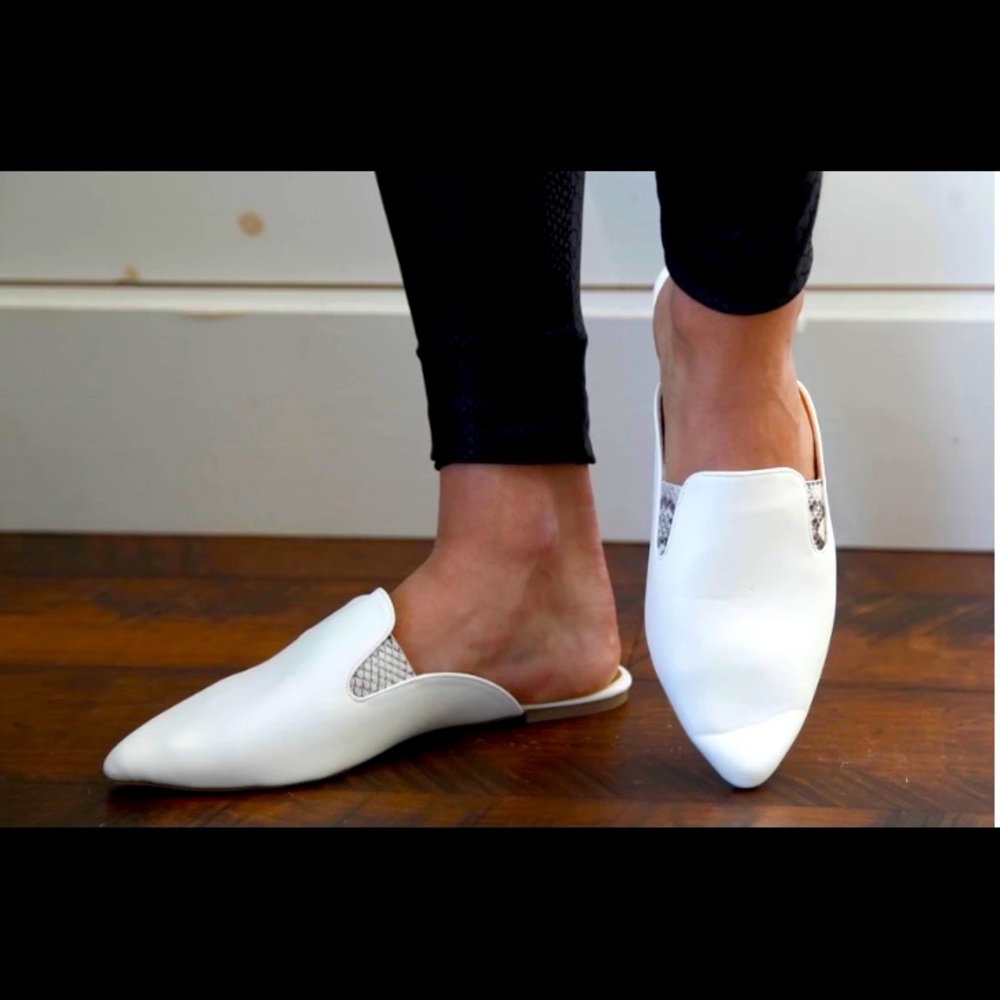 White mules with snakeskin ascent